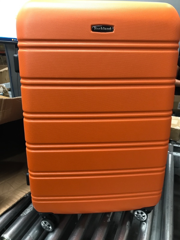 Photo 2 of Rockland Melbourne Hardside Expandable Spinner Wheel Luggage, Orange, Checked-Large 28-Inch Checked-Large 28-Inch Orange