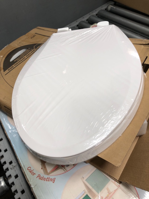 Photo 2 of **DAMAGED**
Elongated Toilet Seat, Cotton White