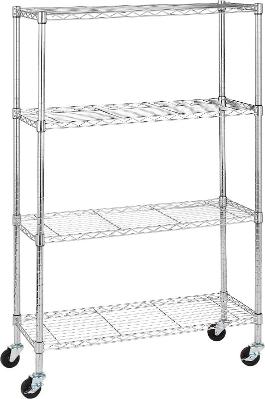 Photo 1 of **DAMAGED UNIT* Amazon Basics 4-Shelf Adjustable, Heavy Duty Storage Shelving Unit on 3'' Wheel Casters, Metal Organizer Wire Rack, Chrome, 36" L x 14" W x 57.8" H
