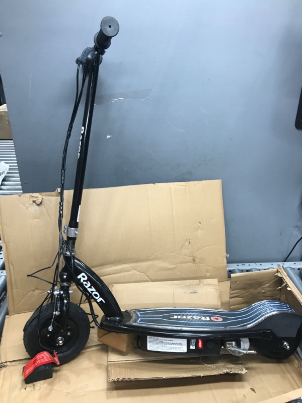 Photo 2 of **TESTED DOESNT ACCELERATE* Razor E100 Electric Scooter for Kids Ages 8+ - 8" Pneumatic Front Tire, Hand-Operated Front Brake, Up to 10 mph and 40 min of Ride Time, For Riders up to 120 lbs