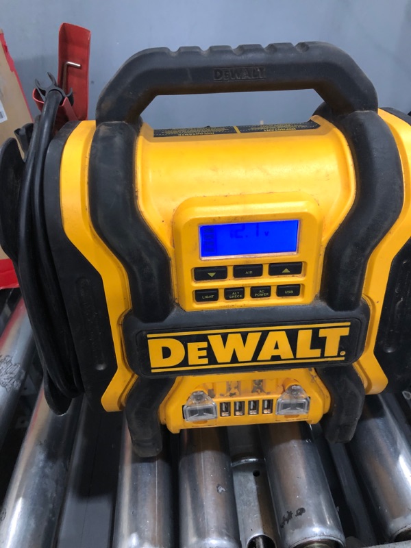 Photo 2 of DEWALT DXAEPS14 1600 Peak Battery Amp 12V Automotive Jump Starter/Power Station with 500 Watt AC Power Inverter, 120 PSI Digital Compressor, and USB Power , Yellow