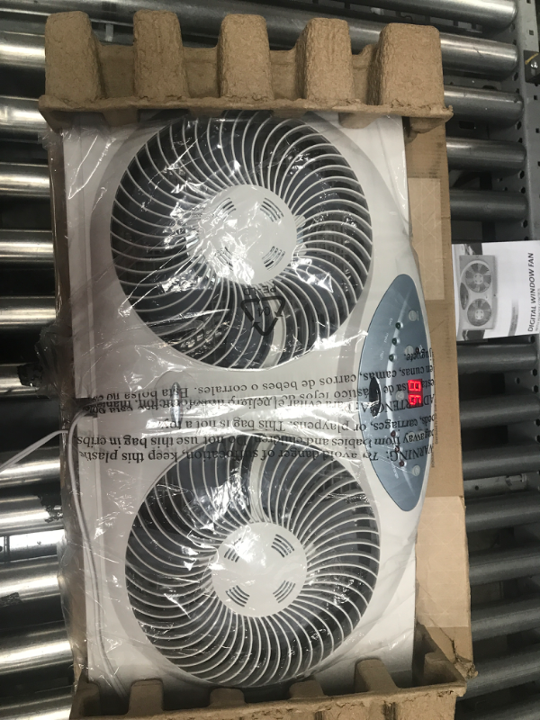 Photo 3 of ***TESTED/ POWERS ON***Bionaire Window Fan with Twin 8.5-Inch Reversible Airflow Blades and Remote Control, White White 2 Blades Electronic control with LCD screen Window Fan