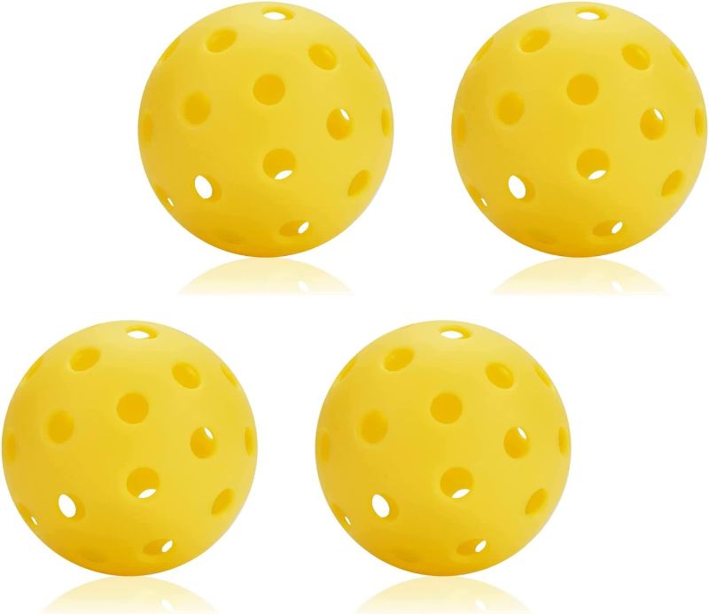 Photo 1 of  2 sets of four Pickleball Balls, 4 Pack 40 Holes Elasticity and Durable Pickleball Balls for Indoor or Outdoor
