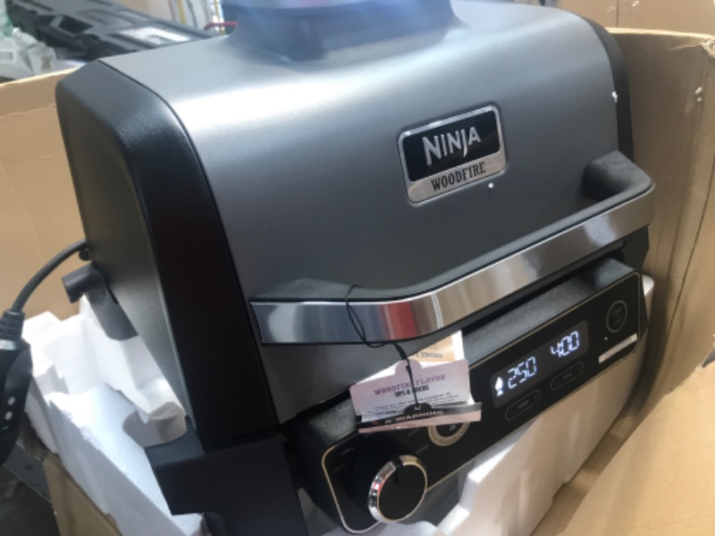 Photo 2 of *MISSING PARTS** Ninja OG701 Woodfire Outdoor Grill, 7-in-1 Master Grill, BBQ Smoker, & Outdoor Air Fryer plus Bake, Roast, Dehydrate, & Broil, Woodfire Technology, uses Ninja Woodfire Pellets, Weather-Resistant, Grey Woodfire Grill