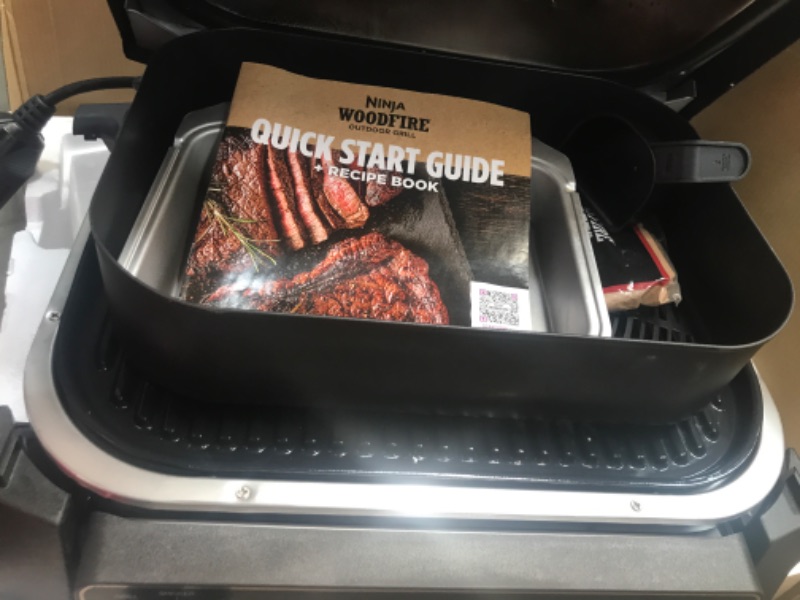 Photo 1 of *MISSING PARTS** Ninja OG701 Woodfire Outdoor Grill, 7-in-1 Master Grill, BBQ Smoker, & Outdoor Air Fryer plus Bake, Roast, Dehydrate, & Broil, Woodfire Technology, uses Ninja Woodfire Pellets, Weather-Resistant, Grey Woodfire Grill