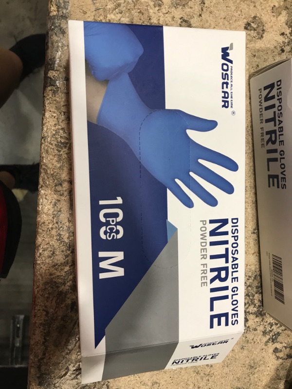 Photo 2 of medium-Wostar Nitrile Disposable Gloves Powder & Latex Free 4mil Touch Screen Disposable Non-Sterile Nitrile Exam Gloves
