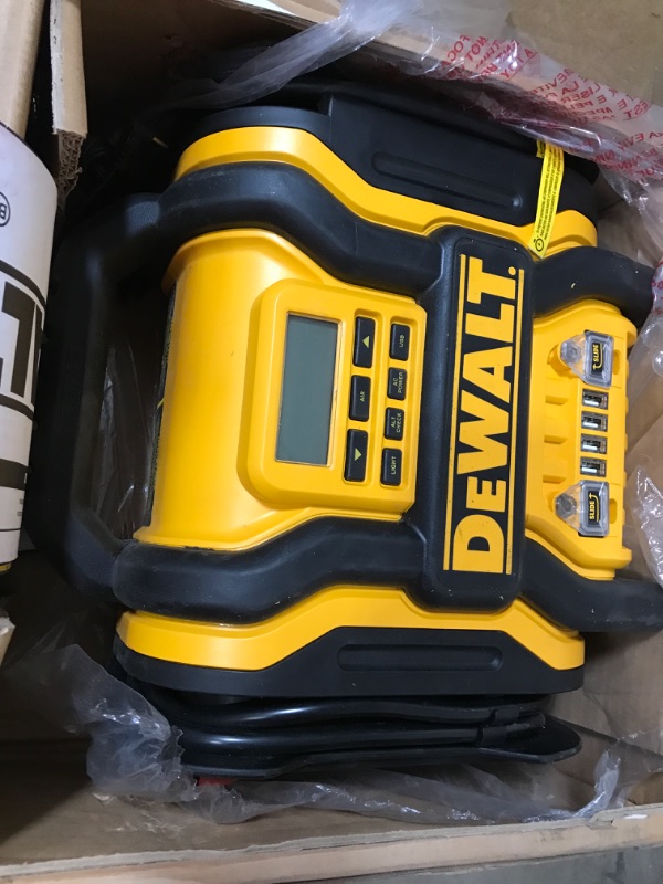 Photo 2 of DEWALT DXAEPS14 1600 Peak Battery Amp 12V Automotive Jump Starter/Power Station with 500 Watt AC Power Inverter, 120 PSI Digital Compressor, and USB Power , Yellow