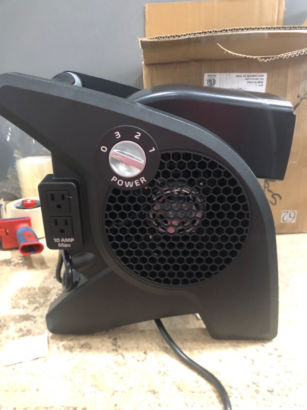 Photo 1 of Lasko High Velocity Pivoting Utility Blower Fan, for Cooling, Ventilating, Exhausting and Drying at Home, Job Site, Construction, 2 AC Outlets, Circuit Breaker with Reset, 3 Speeds, 12", Black, U12104
