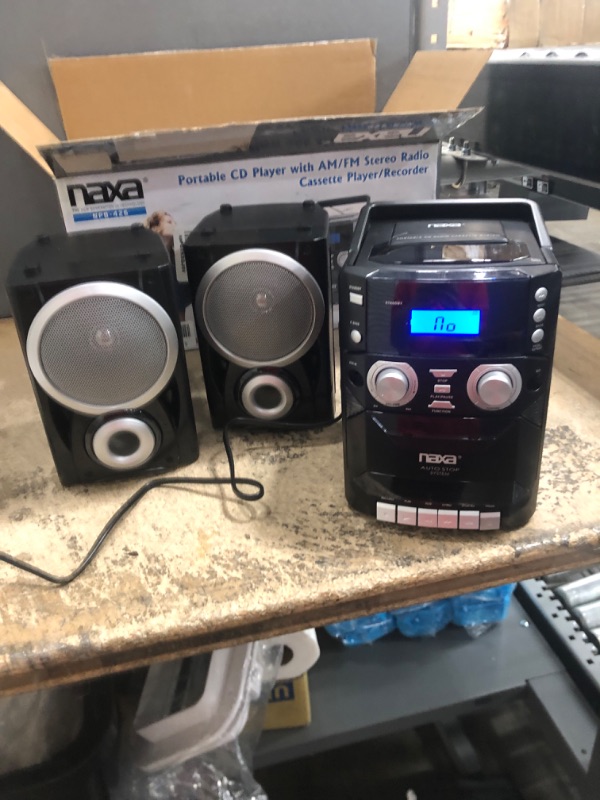 Photo 1 of NAXA Electronics NPB-426 Portable CD Player with AM/FM Stereo Radio, Cassette Player/Recorder and Twin Detachable Speakers
