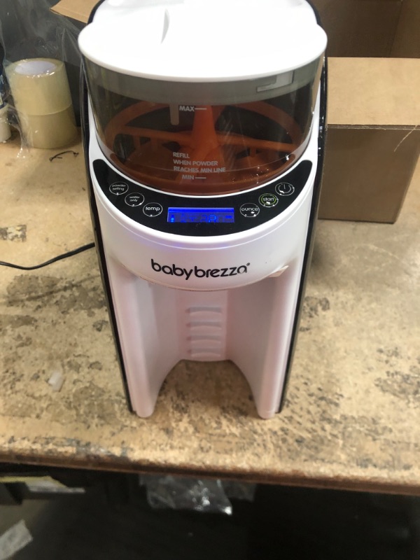 Photo 1 of New and Improved Baby Brezza Formula Pro Advanced Formula Dispenser Machine - Automatically Mix a Warm Formula Bottle Instantly - Easily Make Bottle with Automatic Powder Blending
