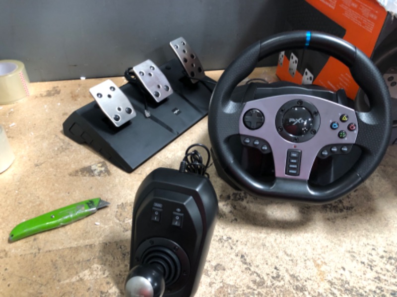 Photo 1 of PXN V9 Gaming Racing Wheel with Pedals and Shifter, Steering Wheel for PC, Xbox One, Xbox Series X/S, PS4, PS3 and Nintendo Switch
***UNABLE TO TEST*****
