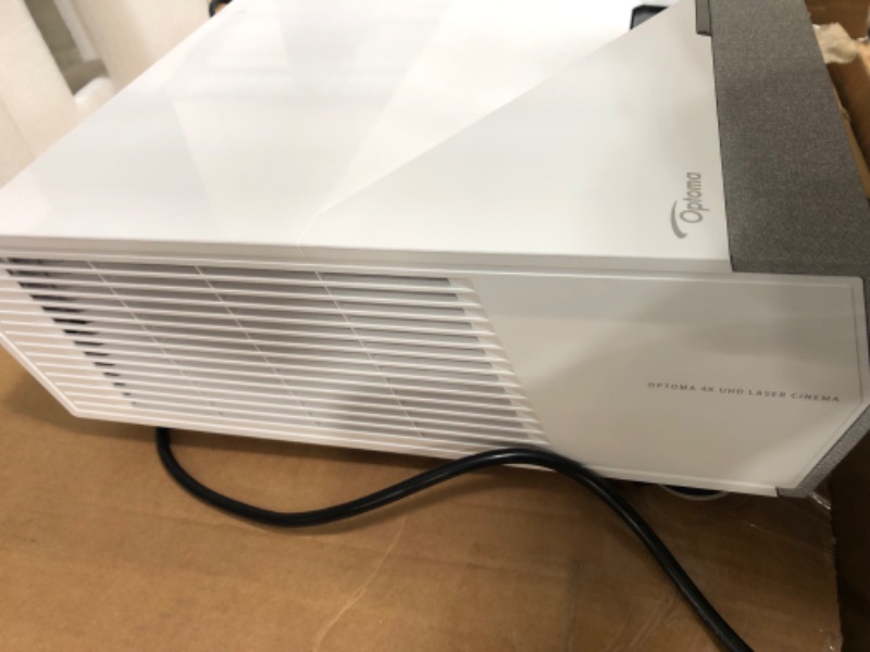 Photo 6 of ***DAMAGED*** needs professional repair*** 3000 Lumens 4K UHD Ultra Short-Throw Laser Projector (The temperature light flashes as soon as being turned on  doesn’t display)
