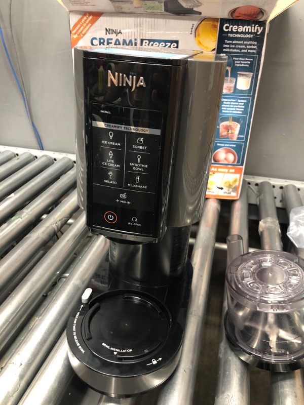 Photo 2 of **SEE NOTES**
Ninja NC201 CREAMi Breeze 7-in-1 Ice Cream & Frozen Treat Maker for Ice Cream, Milkshakes, Smoothie Bowl, Gelato, Sorbet & More, with (2) Pint Containers & Lids, Perfect for Kids, Silver Mist