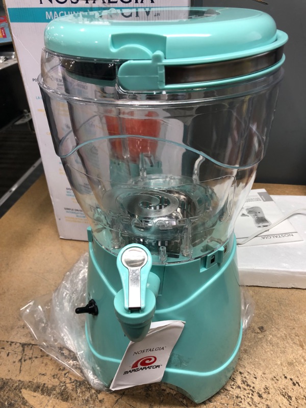 Photo 3 of *** USED *** ** TESTED POWERED ON ** Nostalgia 128-Ounce Margarita Maker & Slushie Machine, Makes One Gallon Frozen Drinks, Stainless Steel Flow Spout and Carry Handle, Creamy Texture, Double Insulated, Easy Clean, 1 gallon, Aqua