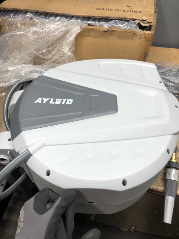 Photo 2 of *** NEW *** Ayleid Retractable Garden Hose Reel,3/5 in x 100 ft Wall Mounted Hose Reel, with 9- Function Sprayer Nozzle, Any Length Lock/Slow Return System/Wall Mounted/180°Swivel Bracket (Grey) 100FT A-gray