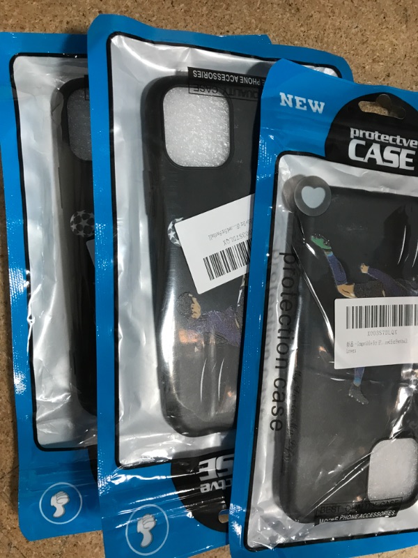 Photo 1 of iPhone 11 pro 3 pack black and soccer cases 