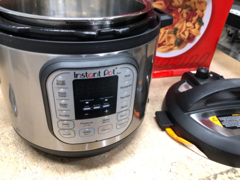 Photo 4 of *** USED IN LIKE NEW CONDITION *** ** HAS SMALL DENT ON THE BACK SEE PICTURES ** Instant Pot Duo 7-in-1 Electric Pressure Cooker, Slow Cooker, Rice Cooker, Steamer, Sauté, Yogurt Maker, Warmer & Sterilizer, Includes App With Over 800 Recipes, Stainless St