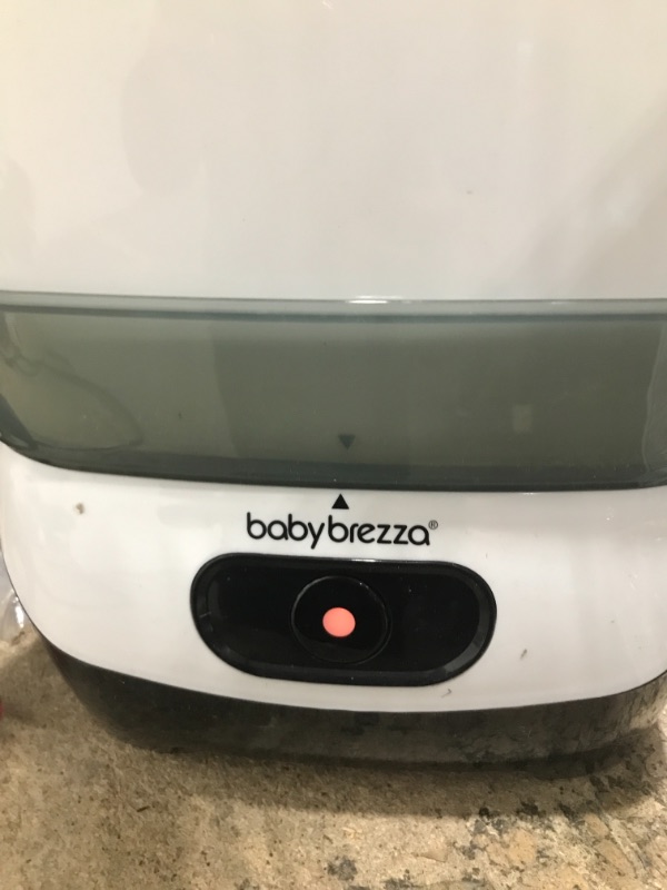 Photo 2 of Baby Brezza Baby Bottle Sterilizer and Dryer Advanced – Electric Steam Sterilization Machine – Universal Sterilizing for All Bottles: Plastic + Glass + Pacifiers + Breast Pump Parts - HEPA Filtration
