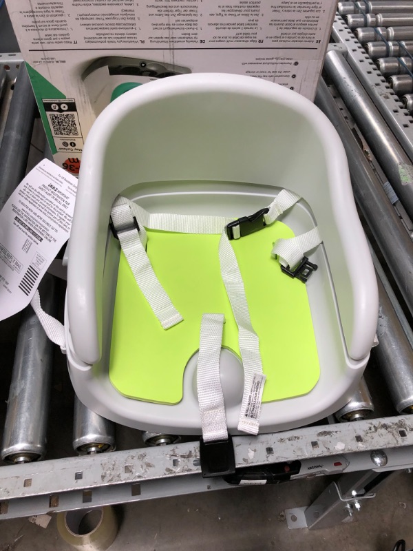 Photo 1 of Baby Einstein Dine & Discover Multi-Use Booster Feeding & Floor Activity Seat with Self-Storing Tray

