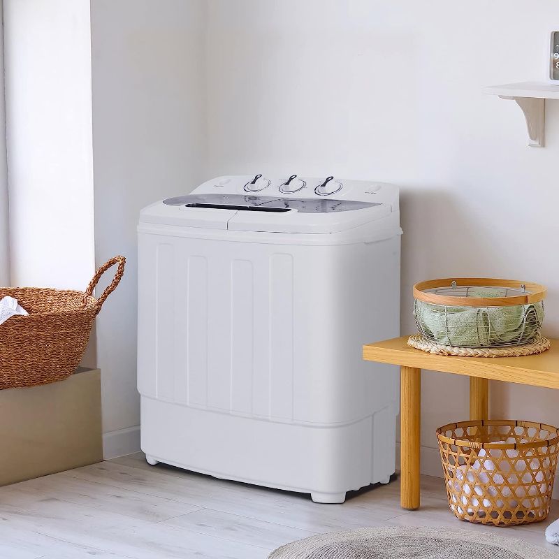 Photo 1 of 
Product Dimensions	13.5"D x 23"W x 26"H

SUPER DEAL Compact Mini Twin Tub Washing Machine, Portable Laundry Washer w/Wash and Spin Cycle Combo, Built-in Gravity Drain, 13lbs Capacity for Camping, Apartments, Dorms, College Rooms, RV’s and more
