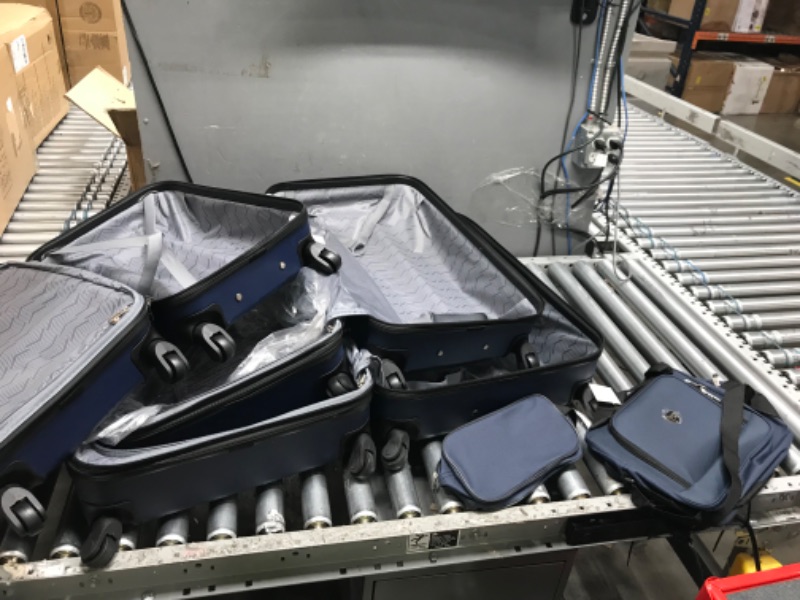 Photo 2 of **large suitcase is broken in the back , see photo**
Travelers Club Chicago Hardside Expandable Spinner Luggage, Navy Blue, 5 Piece Set Navy Blue 5 Piece Set