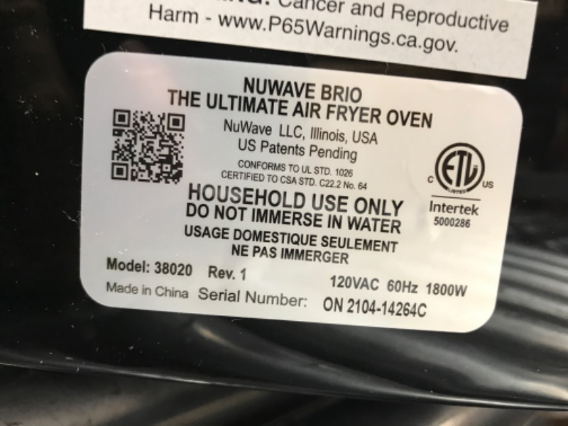 Photo 3 of **SIDE OF OVEN IS FRACTURED BUT FUNCTIONAL**
NUWAVE Brio Air Fryer Smart Oven, 15.5-Qt X-Large Family Size, Countertop Convection Rotisserie Grill Combo, Non-Stick Drip Tray, Stainless Steel Rotisserie Basket. 15.5QT Brio