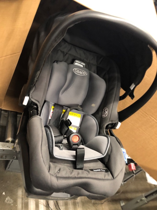 Photo 3 of **SEAT COVERS NEED TO BE WASHED**
Graco SnugRide SnugLock 35 LX Infant Car Seat, Baby Car Seat Featuring TrueShield Side Impact Technology
