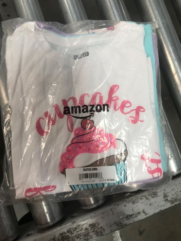 Photo 2 of Amazon Essentials Girls and Toddlers' Short-Sleeve T-Shirt Tops (Previously Spotted Zebra), Multipacks 4 Purple/Blue/White, Cupcake/Unicorn Small