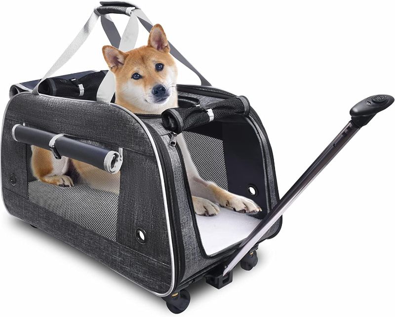 Photo 1 of *SIMILKAR TO STOCK PHOTO* mobile pet carrier on wheels with bedded inside 