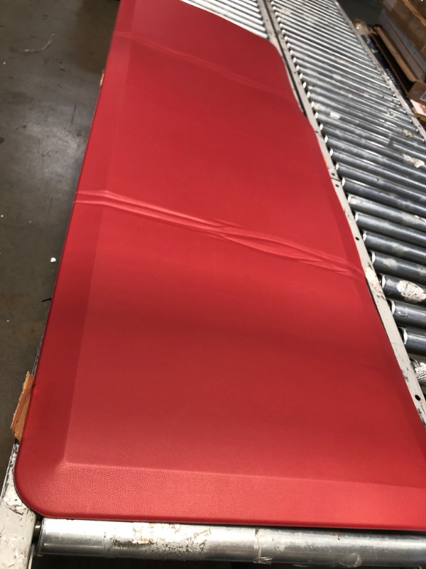 Photo 1 of 2' x 7' red foam mat 