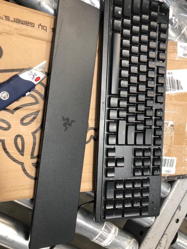 Photo 2 of Razer Ornata V3 X Gaming Keyboard: Low-Profile Keys - Silent Membrane Switches - Spill Resistant - Chroma RGB Lighting - Ergonomic Wrist Rest - Classic Black (Renewed)