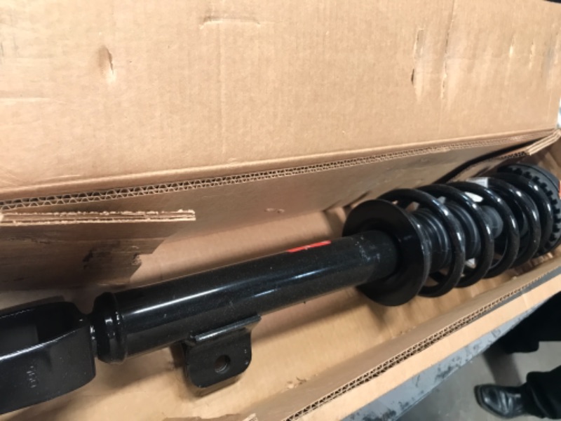 Photo 1 of Monroe Shocks & Struts Quick-Strut 472665 Strut and Coil Spring Assembly