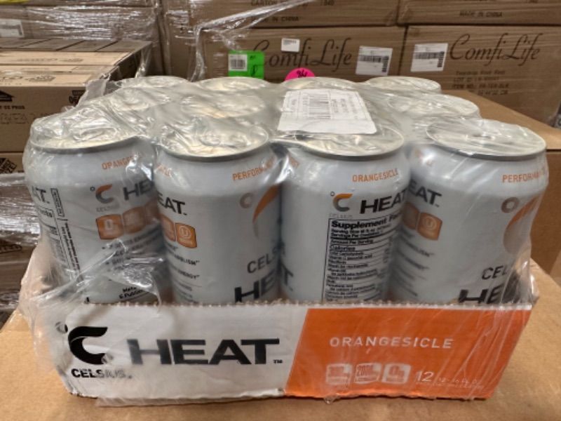 Photo 2 of **EXP 7/23**
CELSIUS HEAT Orangesicle Performance Energy Drink, Zero Sugar, 16oz. Can (Pack of 12)