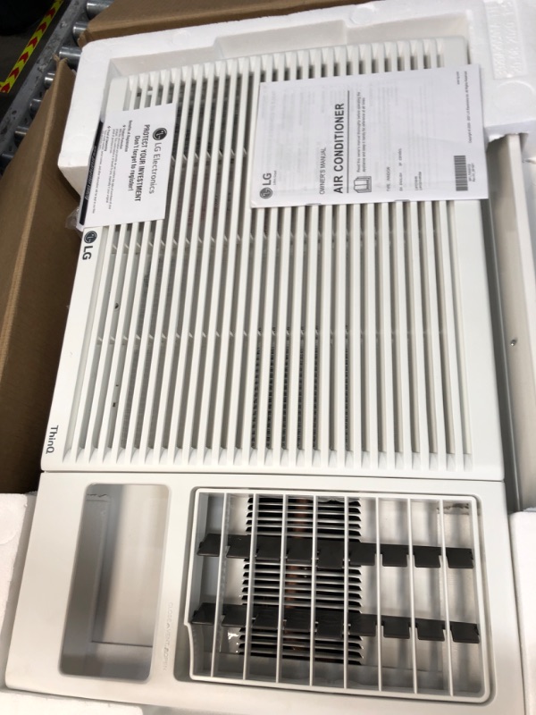 Photo 1 of **SEE NOTES**
LG 12,000 BTU Window Air Conditioner with Supplemental Heat, Cools 550 Sq.Ft. (22' x 25' Room Size), Electronic Controls with Remote, 2 Cooling, Heating & Fan Speeds, Slide In-Out Chassis, 230/208V
