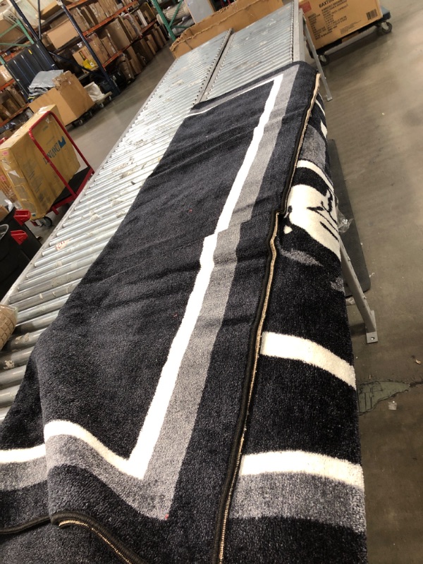 Photo 1 of 10' x 7'3" RAIDERS area rug