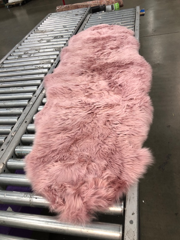 Photo 1 of 6' X 2' FUZZY PINK RUNNER RUG