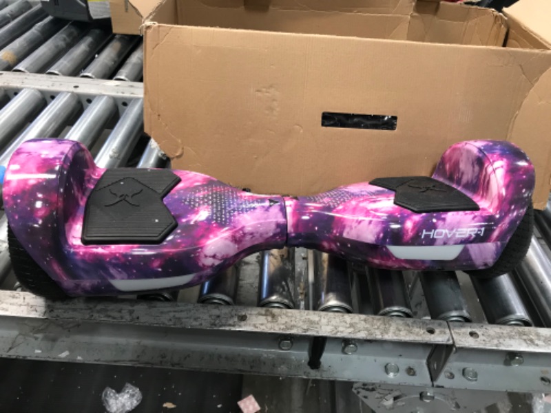 Photo 3 of **NON FUNCATIONAL ,  PARTS ONLY ***
Hover-1 Helix Electric Hoverboard | 7MPH Top Speed, 4 Mile Range, 6HR Full-Charge, Built-in Bluetooth Speaker, Rider Modes: Beginner to Expert Hoverboard Galaxy