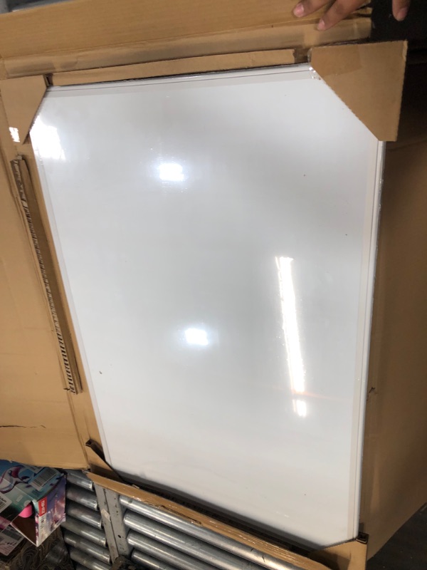 Photo 1 of Amazon Basics Magnetic Dry Erase White Board, 36 x 24-Inch Whiteboard - Silver Aluminum Frame 24" x 36" Magnetic, Aluminum Frame
