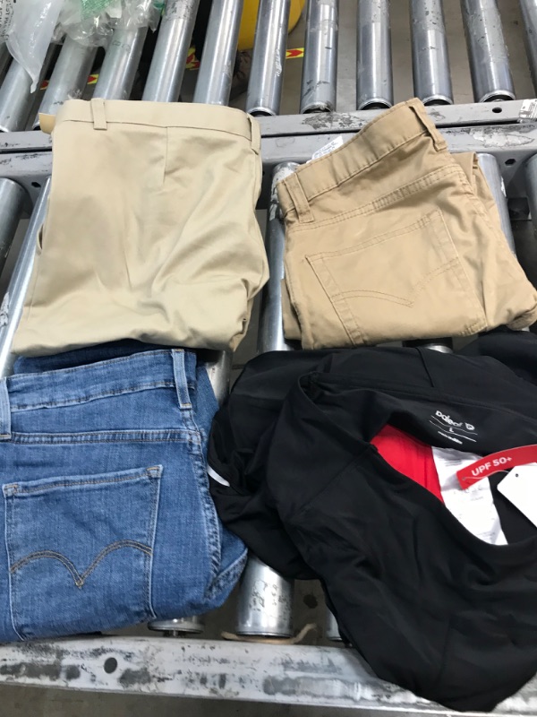 Photo 1 of 4 pcs assorted pants sizes vary