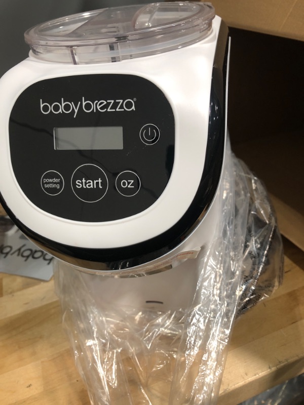 Photo 3 of Baby Brezza Formula Pro Mini Baby Formula Maker – Small Baby Formula Mixer Machine Fits Small Spaces and is Portable for Travel– Bottle Makers Makes The Perfect Bottle for Your Infant On The Go Formula Pro Mini Dispenser Machine