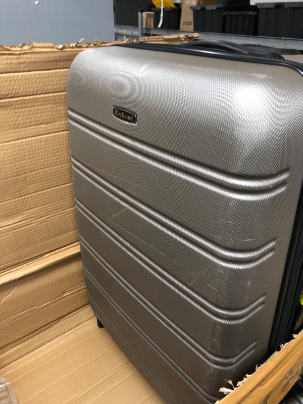 Photo 3 of **SEE NOTES**
Rockland Melbourne Hardside Expandable Spinner Wheel Luggage, Silver, Checked-Large 28-Inch Checked-Large 28-Inch Silver