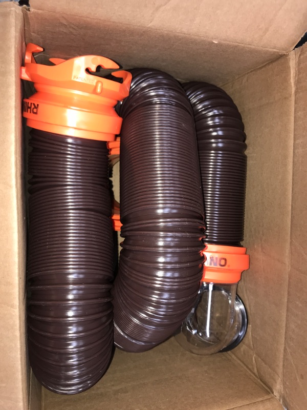 Photo 2 of Camco RhinoFLEX RV Sewer Hose Kit with Swivel Transparent Elbow and 4-in-1 Dump Station Fitting, Brown, 15 Feet (39770) 15ft Sewer Hose Kit Frustration-Free Packaging