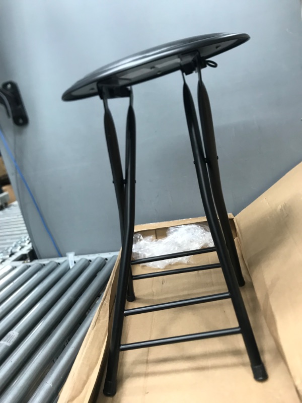 Photo 1 of **SLIGHTLY BENT**
foldable black stool