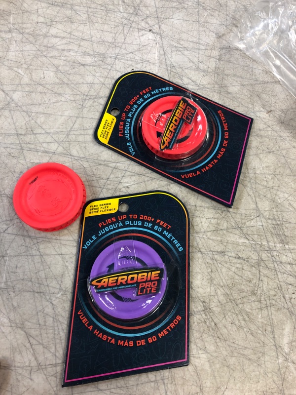 Photo 2 of Aerobie Pro Lite Miniature Throwing Discs, Perfect for Kids, Backyard Games & Disc Golf, Outdoor Games for Adults and Family Ages 5 & Up (Pack of 3) Pro Lite Discs - Pack of 3