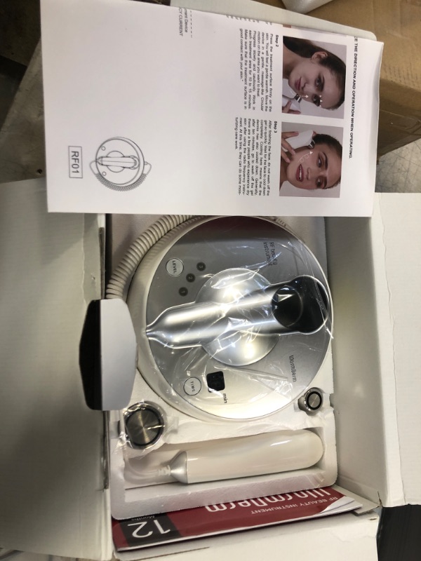 Photo 2 of WarmDerm Professional Home Grooming Device for Face and Body, 3 Energy Levels - Salon Effect Silver