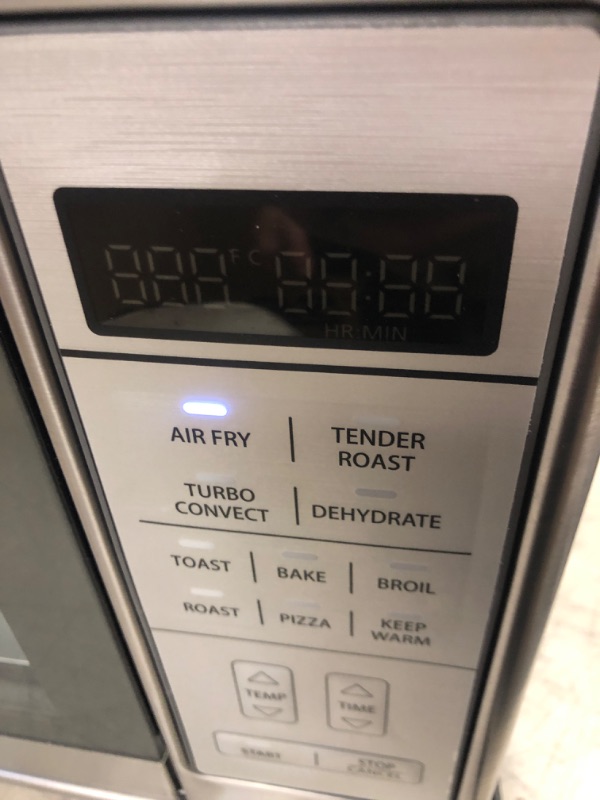 Photo 1 of Oster Air Fryer Oven, 10-in-1 Countertop Toaster Oven Air Fryer Combo, 10.5" x 13" Fits 2 Large Pizzas, Stainless Steel

