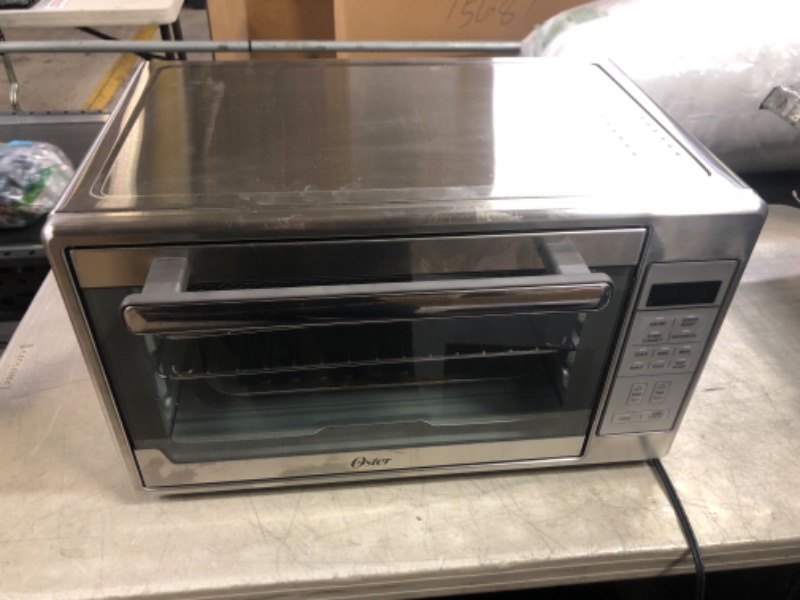 Photo 3 of Oster Air Fryer Oven, 10-in-1 Countertop Toaster Oven Air Fryer Combo, 10.5" x 13" Fits 2 Large Pizzas, Stainless Steel
