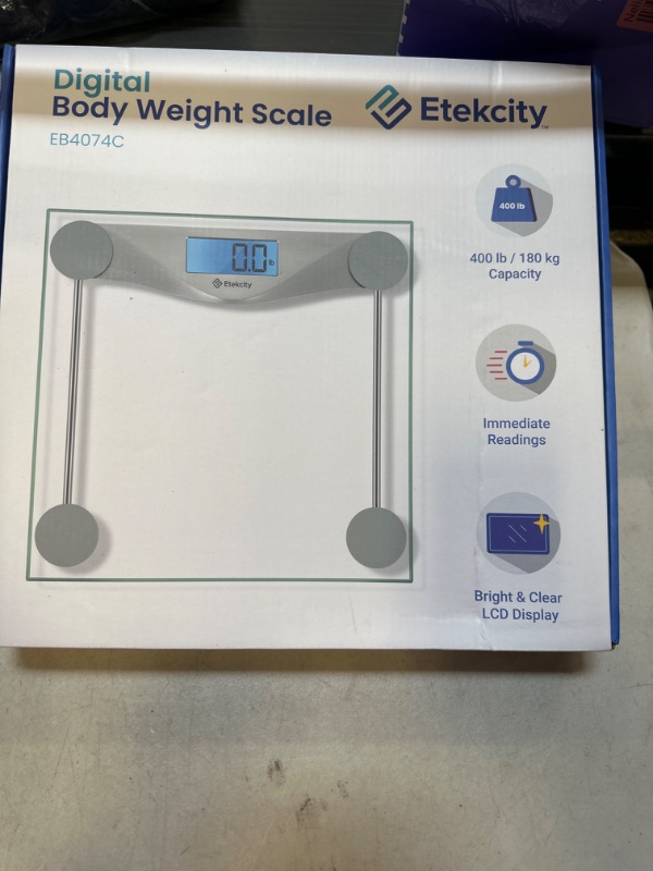 Photo 1 of Etekcity Digital Body Weight Bathroom Scale, Large Blue LCD Backlight Display, High Precision Measurements,6mm Tempered Glass, 400 Pounds Non Smart Silver