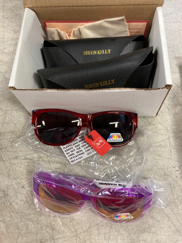 Photo 1 of 2 pairs of glasses with cases-