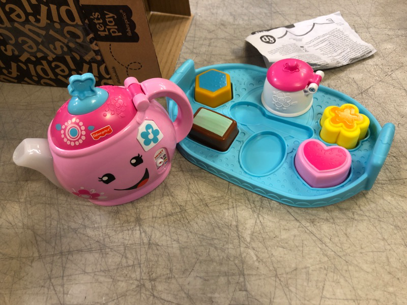 Photo 2 of Fisher-Price Laugh & Learn Toddler Toy Sweet Manners Tea Set With Music And Lights For Educational Pretend Play Ages 18+ Months Frustration Free Packaging